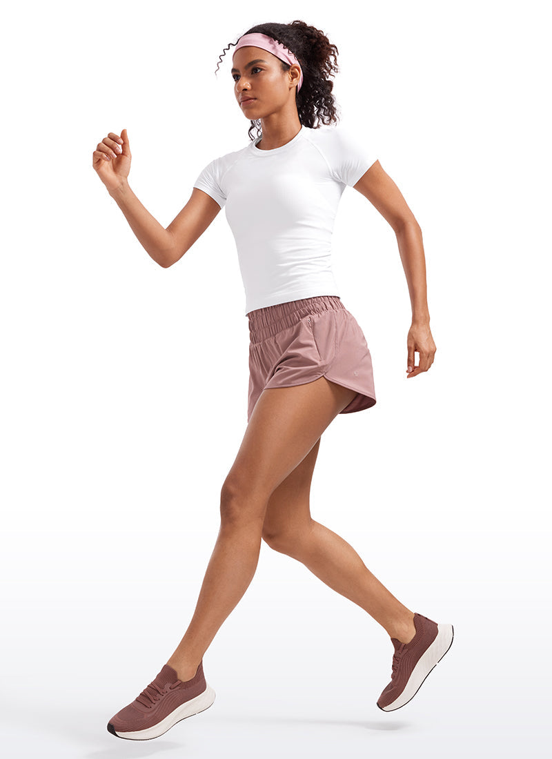 Feathery-Fit Soft High Waisted Dolphin Running Shorts With Zipper Pocket 3''