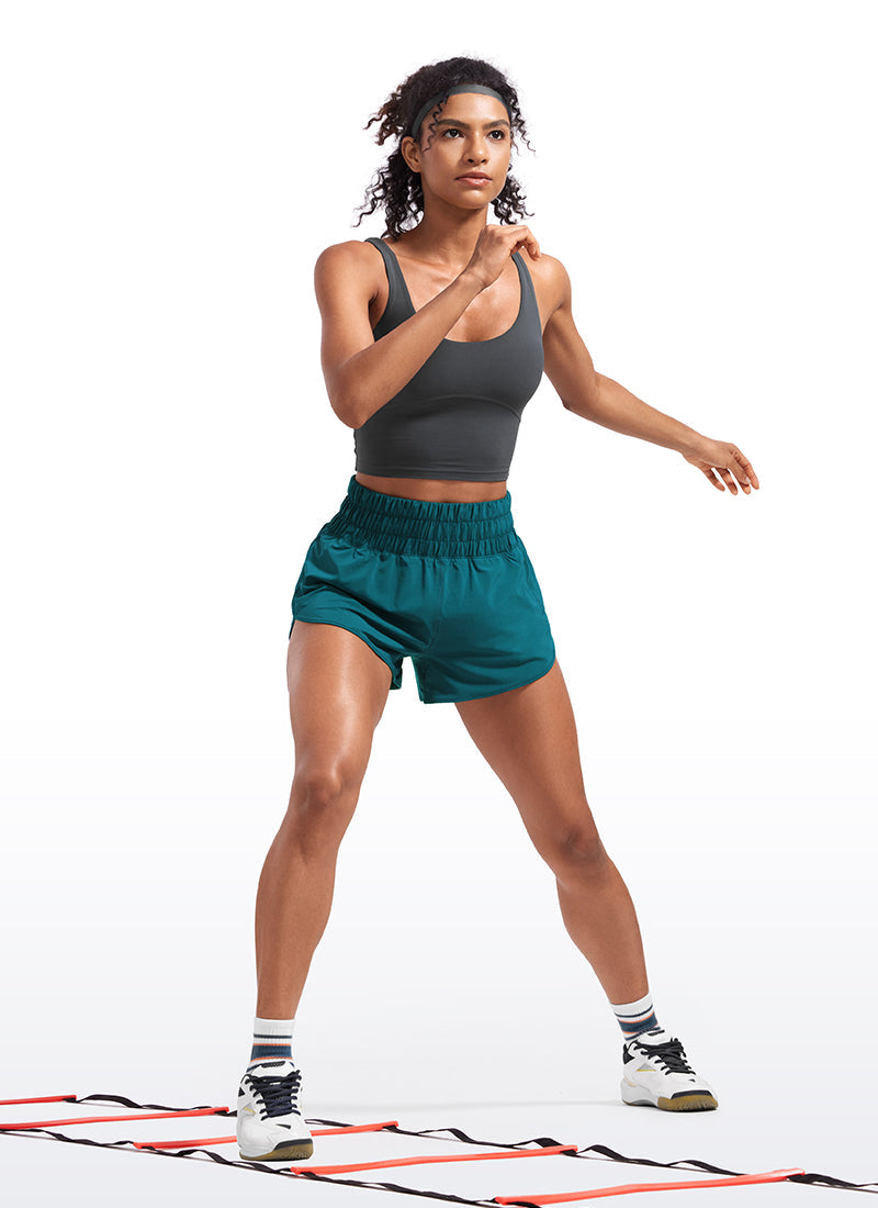Feathery-Fit Soft High Waisted Dolphin Running Shorts With Zipper Pocket 3''