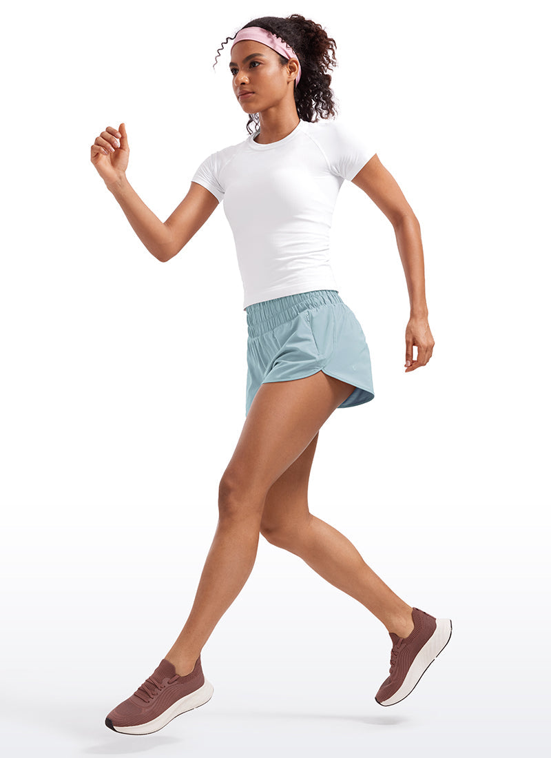 Feathery-Fit Soft High Waisted Dolphin Running Shorts With Zipper Pocket 3''