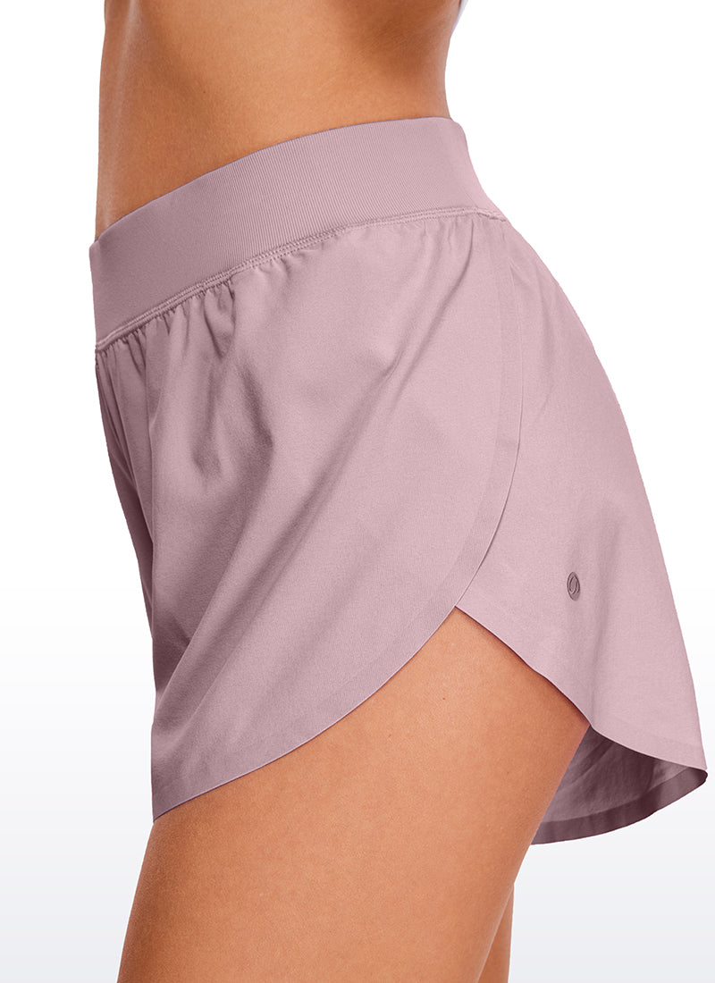 Feathery-Fit Soft Mid Rise Dolphin Lined Shorts 4''